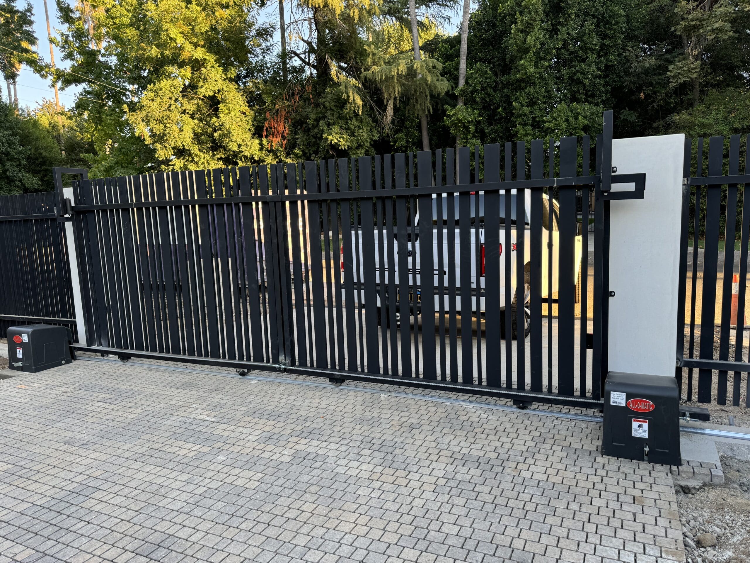 Black modern gate with automatic opener