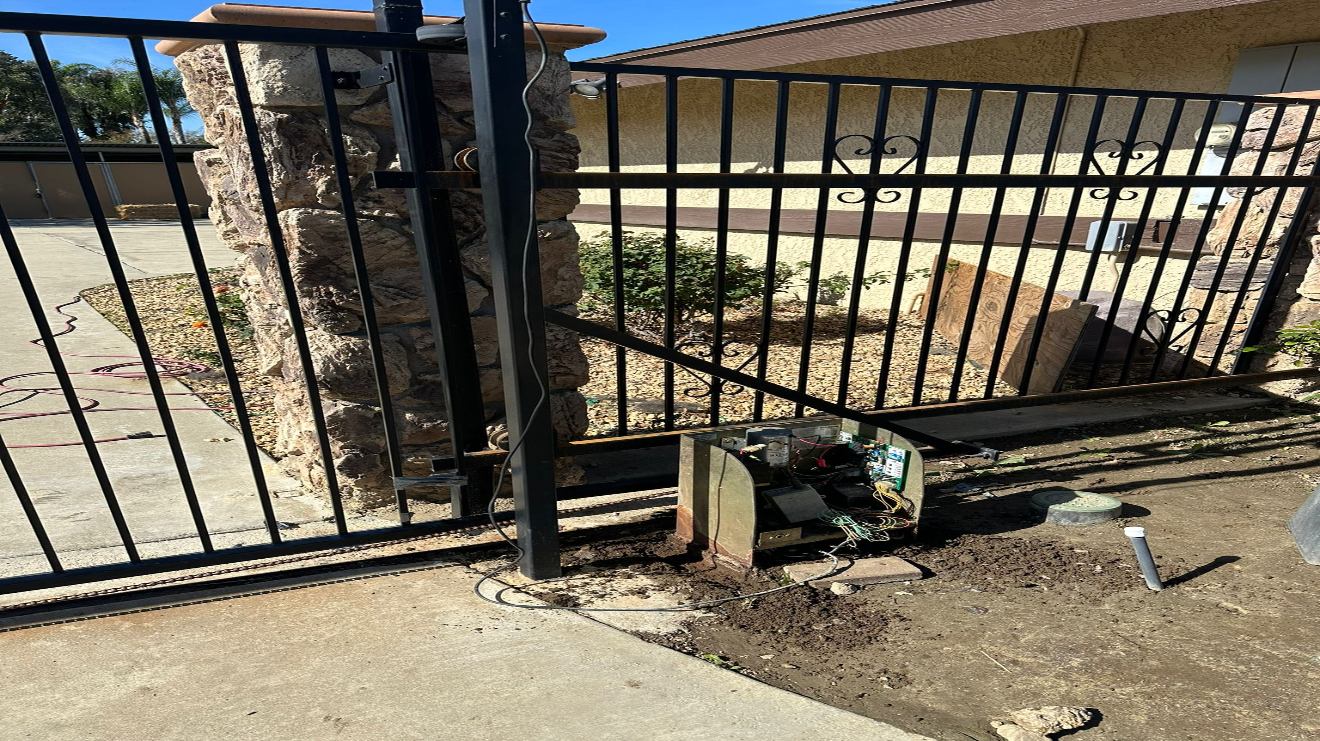 Open gate with electrical components visible