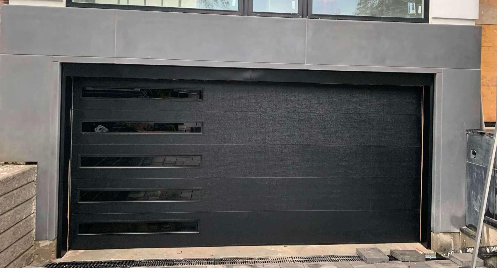 Modern black garage door design